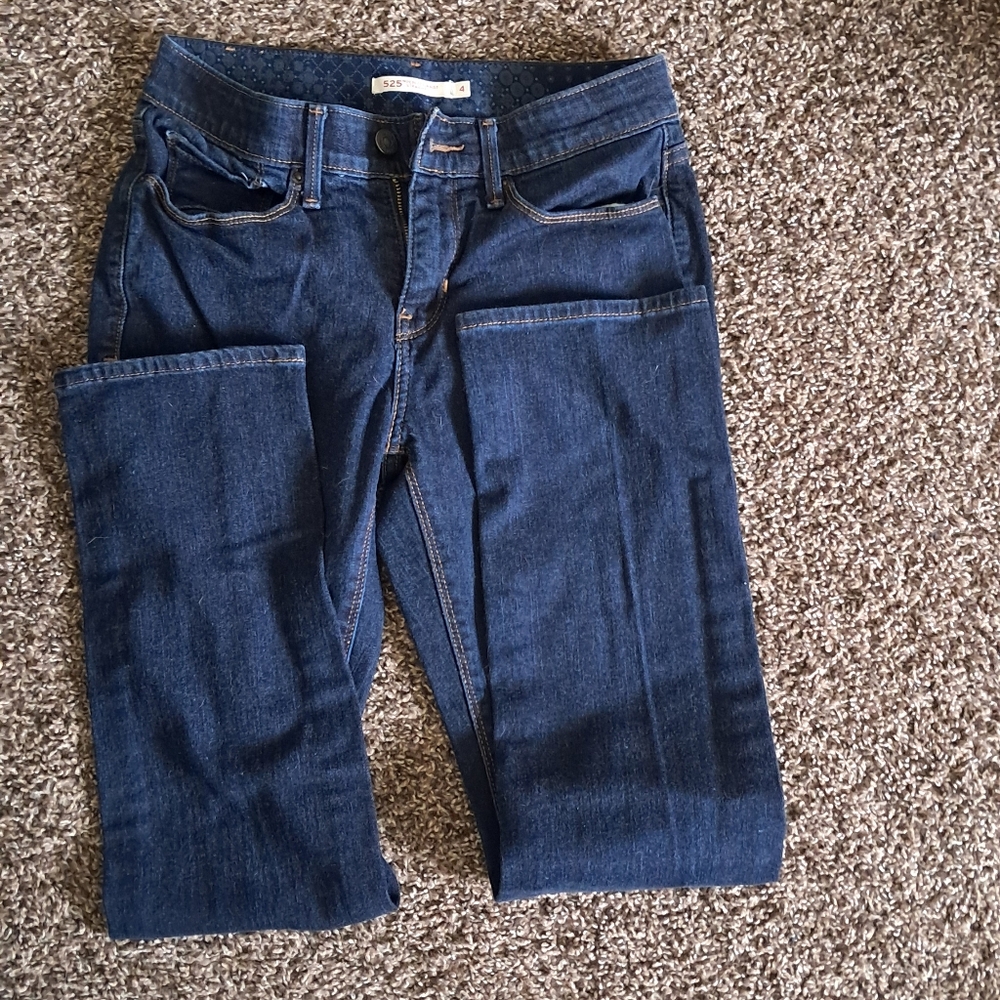 Dark blue stretchy woman's or girl's jeans, barely used.